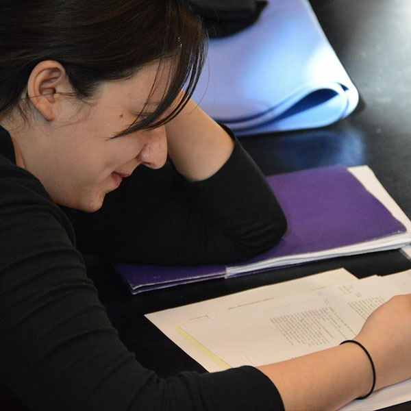 woman doing assignment for certification